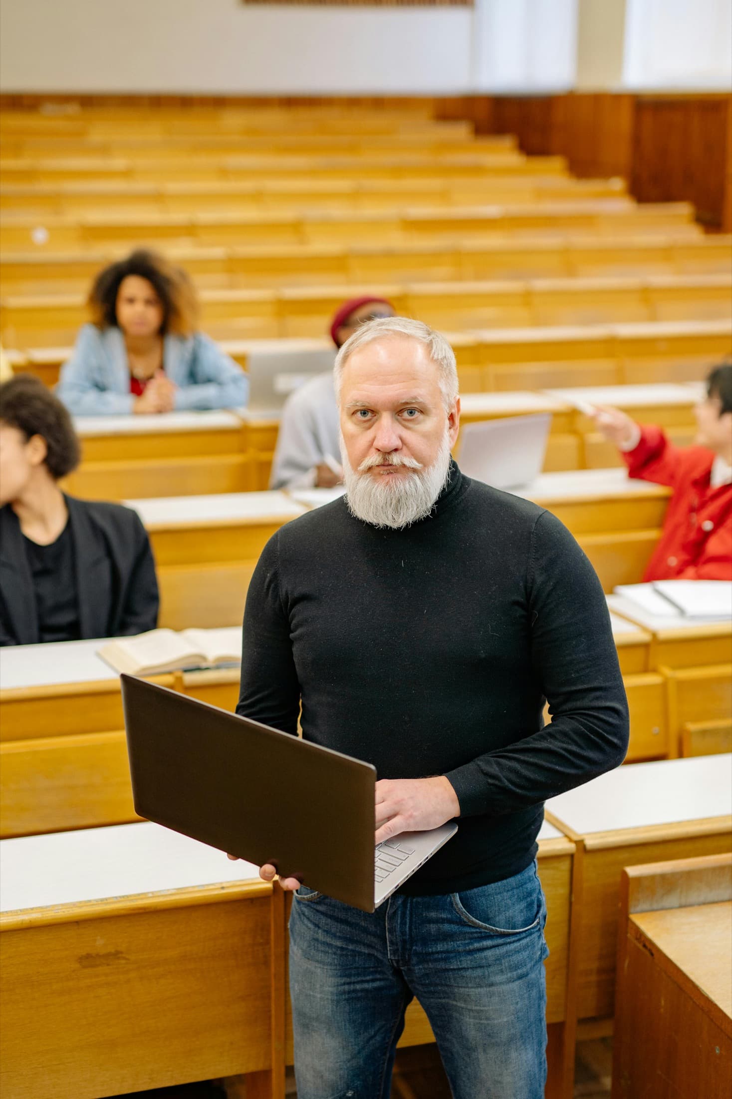 School administrator using a laptop